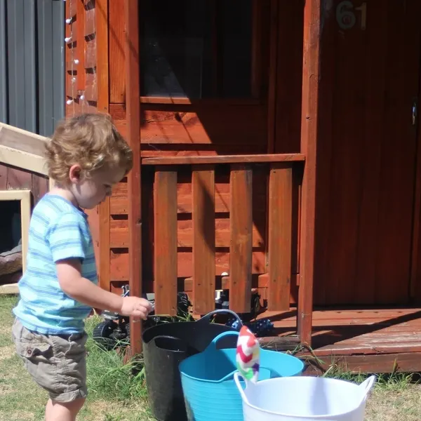 Child engaging in a playful movement activity